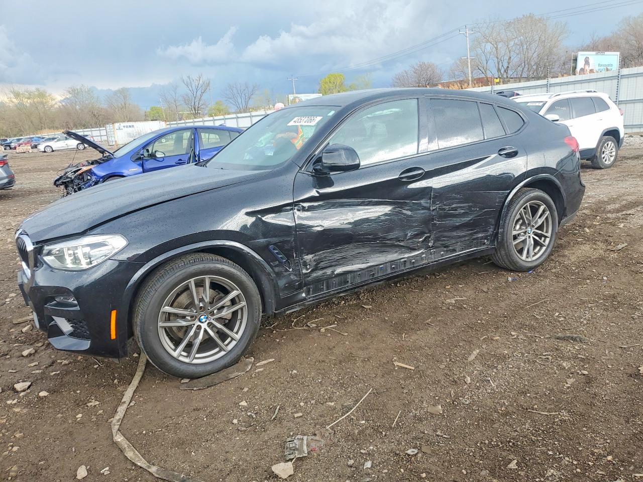 2021 BMW X4 xDrive30i, VIN 5UX2V1C07M9D82414 — Side