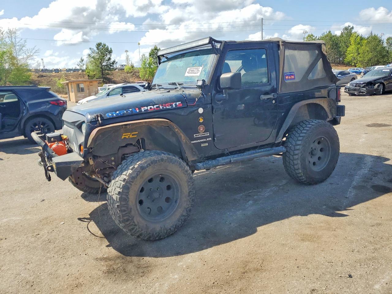 2012 Jeep Wrangler Sport, VIN 1C4AJWAG3CL102055 — Minor dents and scratches