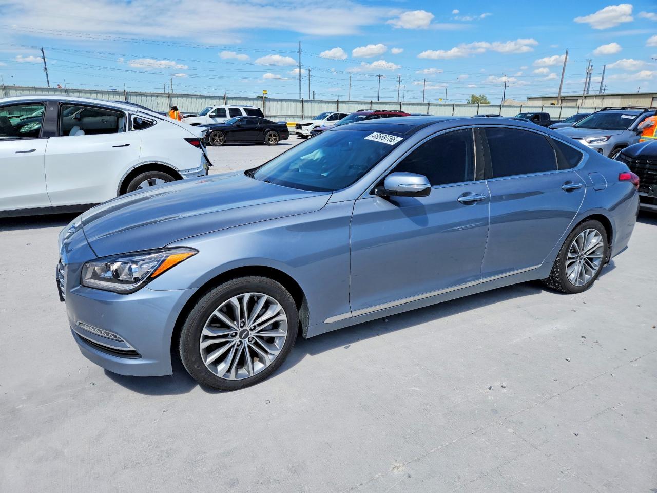2017 Genesis G80 3.8L, VIN KMHGN4JEXHU177057 — Side