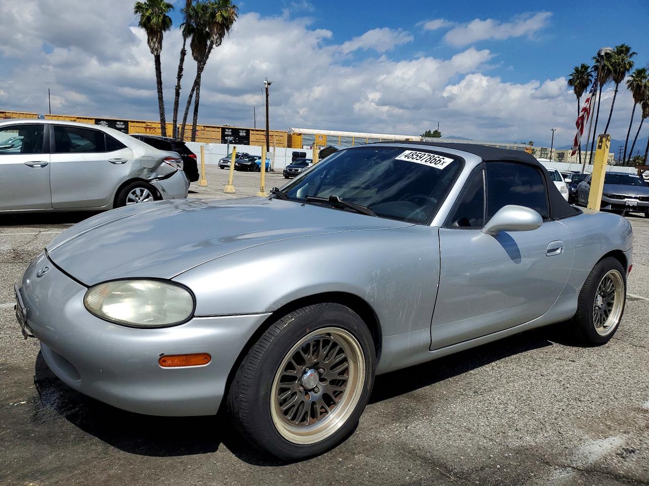 1999 Mazda MX-5 Miata, VIN JM1NB3535X0125560 — Minor dents and scratches
