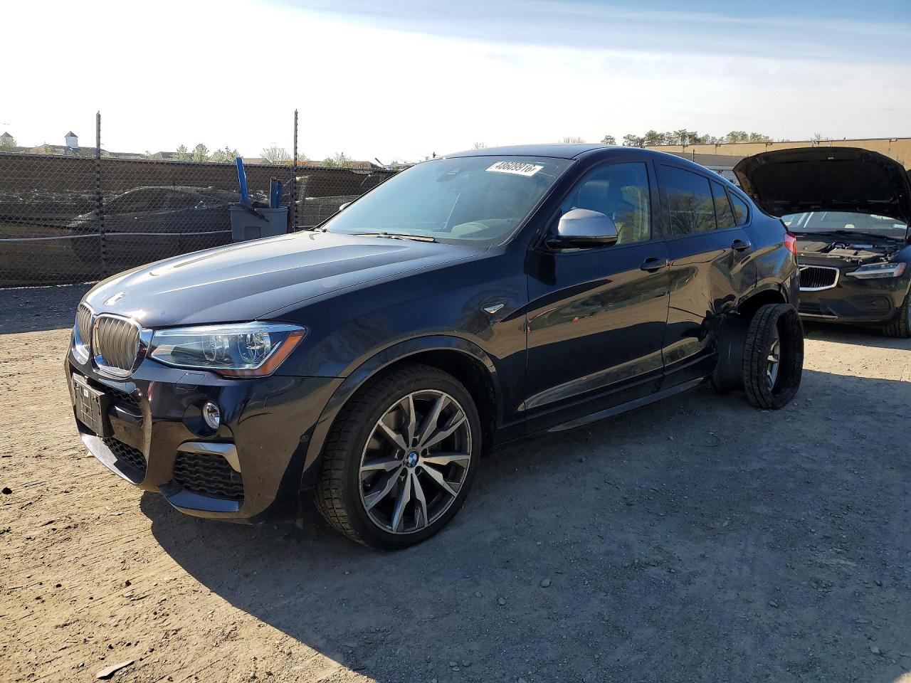 2017 BMW X4 M40i, VIN 5UXXW7C35H0U26367 — Side