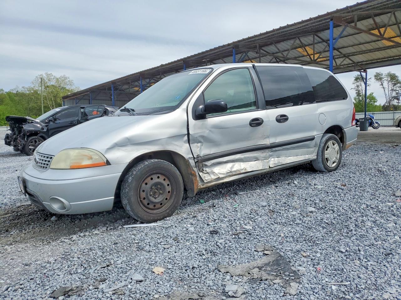 2003 Ford Windstar, VIN 2FMZA50403BA64915 — Бок