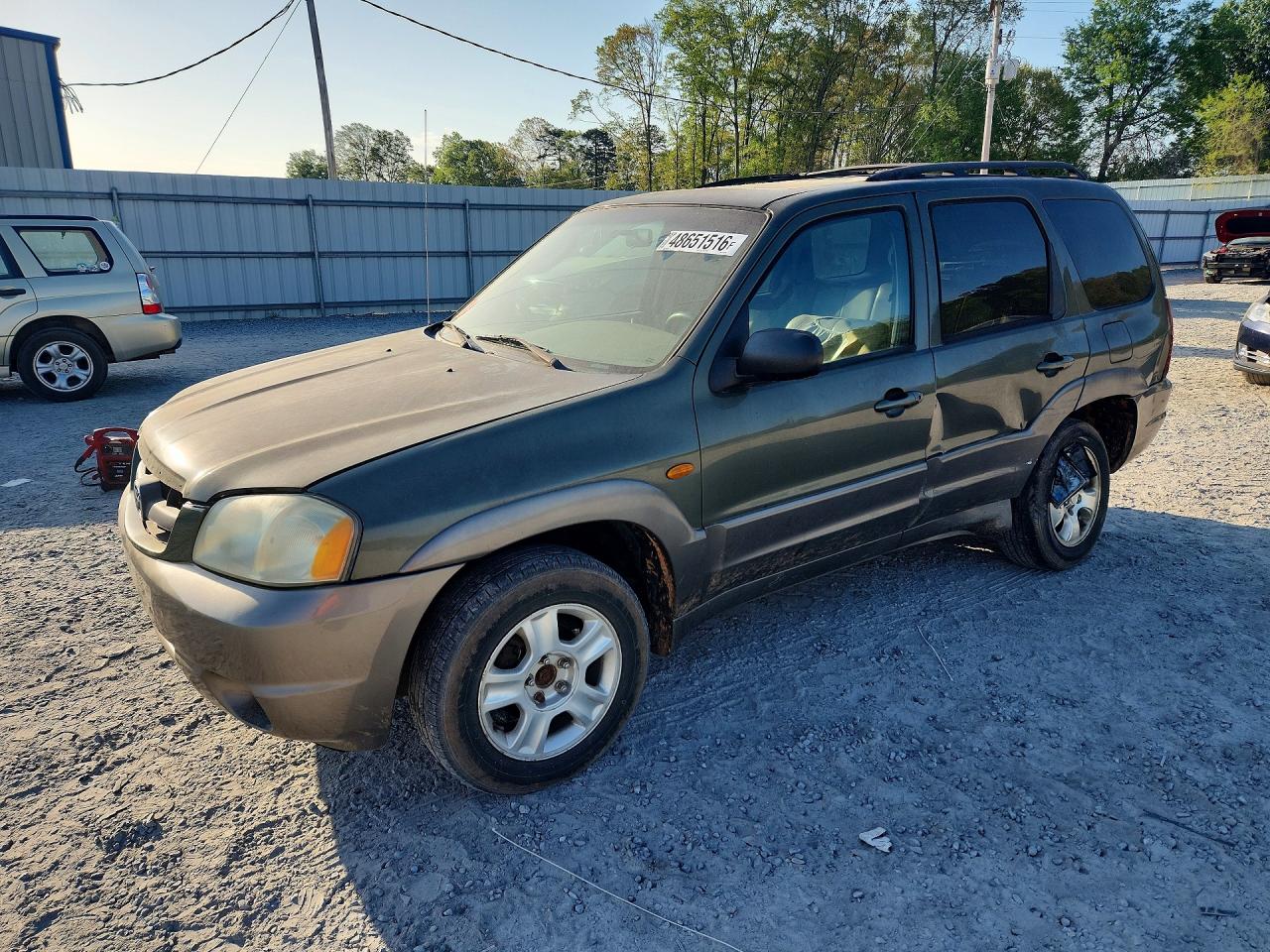 2002 Mazda Tribute LX, VIN 4F2CU08122KM35706 — Side
