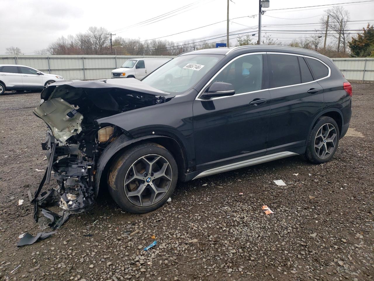 2018 BMW X1 xDrive28i, VIN WBXHT3C38J5L29912 — Front end