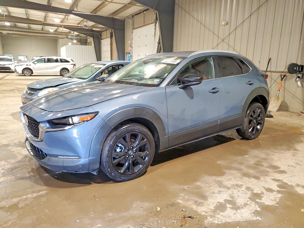 2023 Mazda CX-30 S Carbon Edition, VIN 3MVDMBCM6PM531600 — Side
