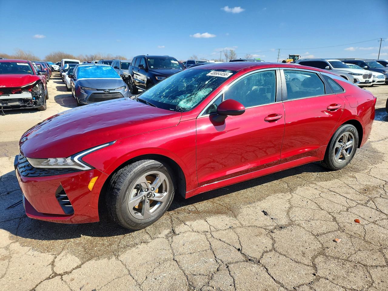 2021 Kia K5 LXS, VIN 5XXG14J2XMG023440 — Hail