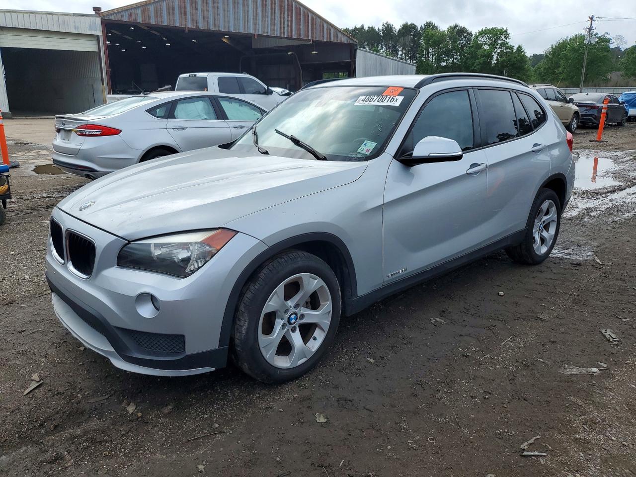 2015 BMW X1 sDrive28i, VIN WBAVM1C58FV318366 — Rear end
