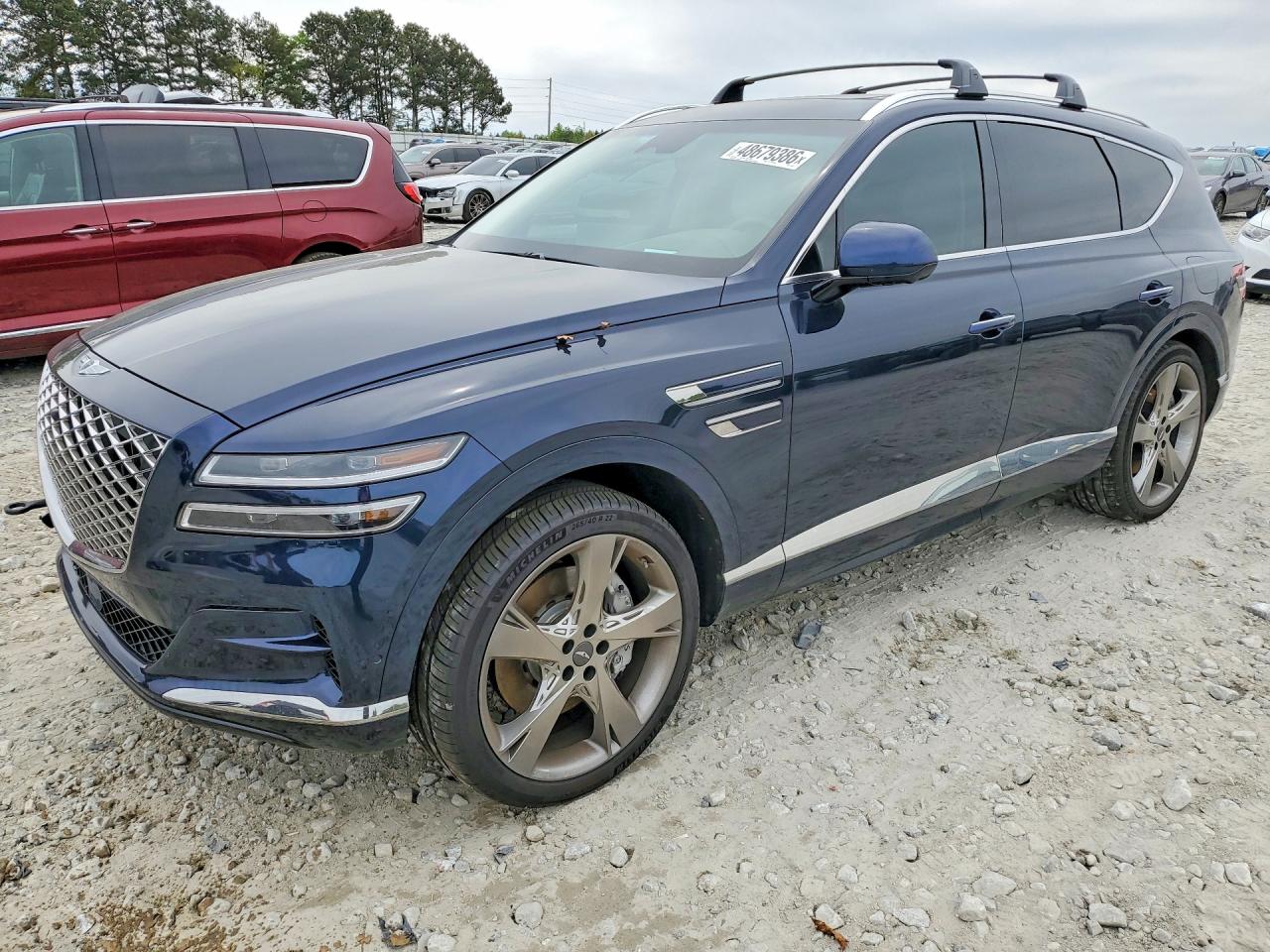 2023 Genesis GV80, VIN KMUHCESC3PU108398 — Side