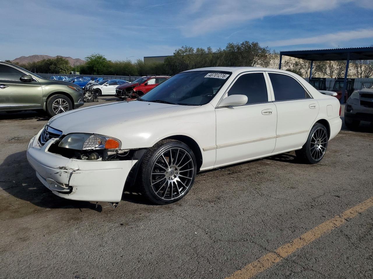2001 Mazda 626 LX, VIN 1YVGF22D115204572 — Front end