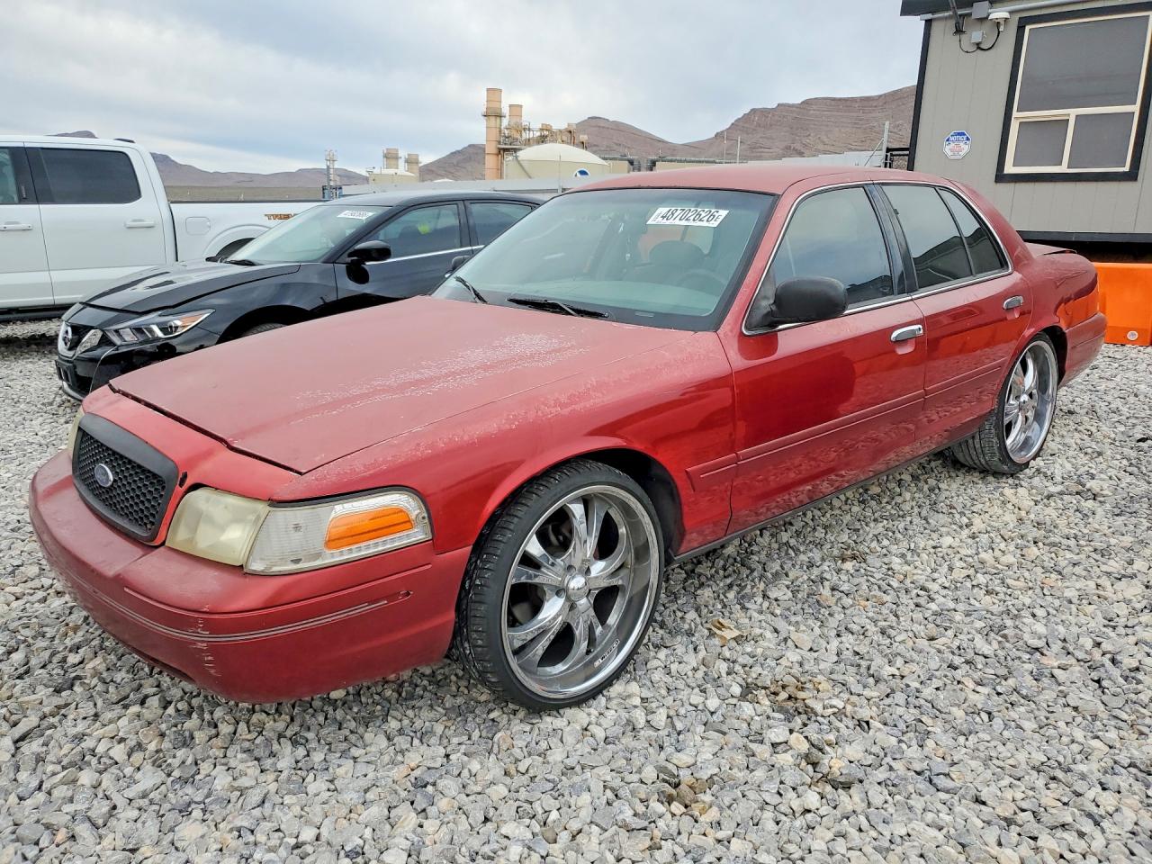 1999 Ford Crown Victoria, VIN 2FAFP73W8XX176455 — Rear end