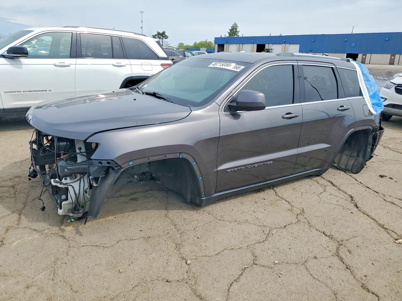 2021 Jeep Grand Cherokee Laredo E, VIN 1C4RJEAG1MC713510 — Stripped