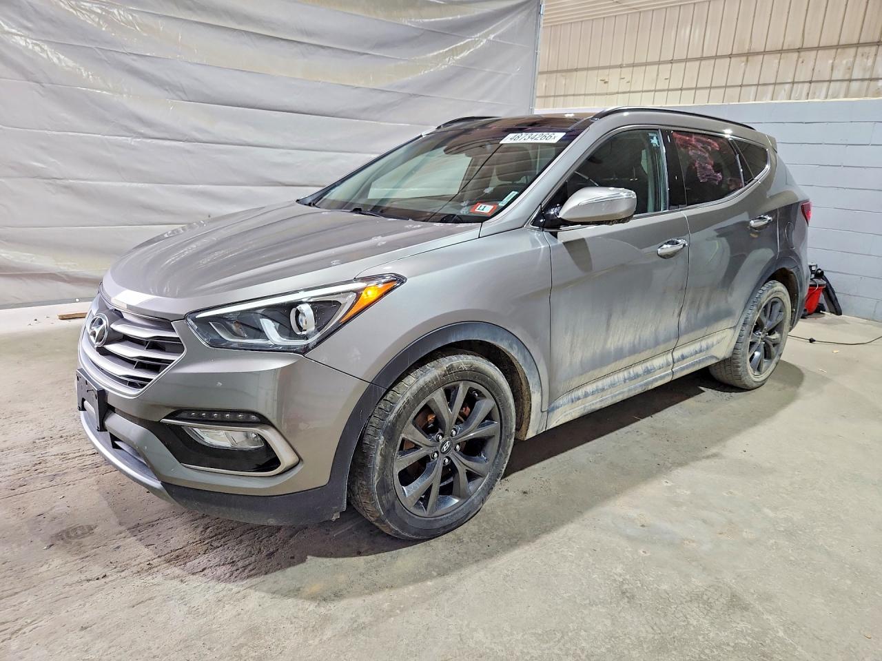 2017 Hyundai Santa Fe Ultimate, VIN 5XYZWDLA9HG413963 — Front end