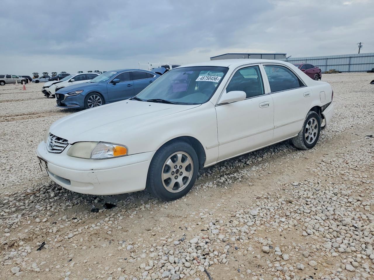 2000 Mazda 626 LX, VIN 1YVGF22C2Y5173284 — Rear end