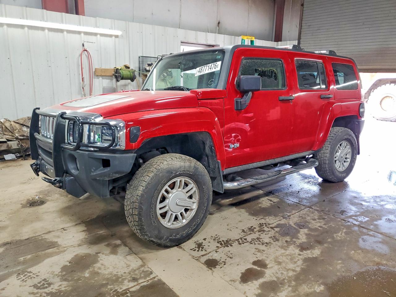 2010 Hummer H3, VIN 5GTMNGEE6A8118789 — Side