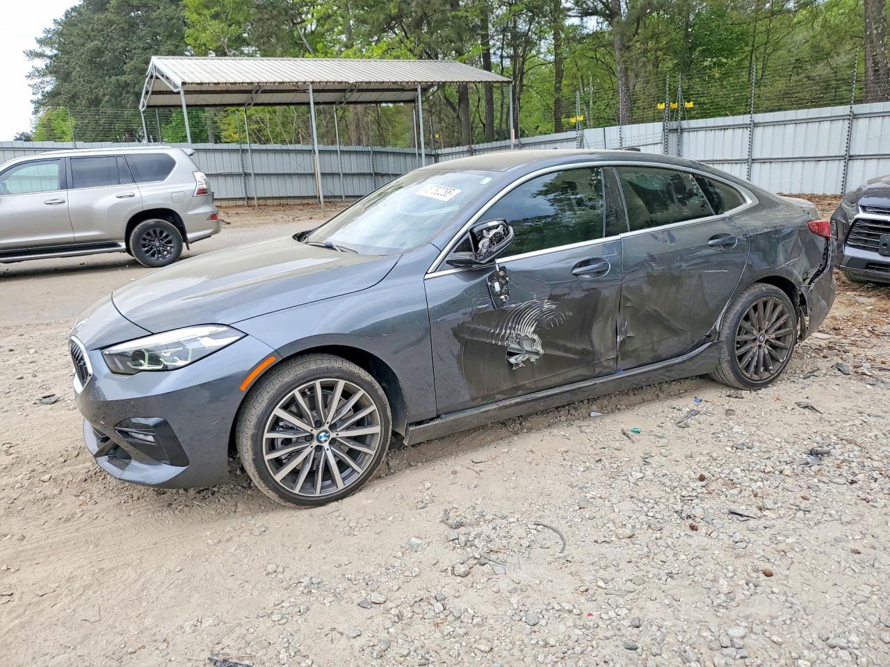 2021 BMW 2 Series 228i, VIN WBA53AK02M7J11921 — Side