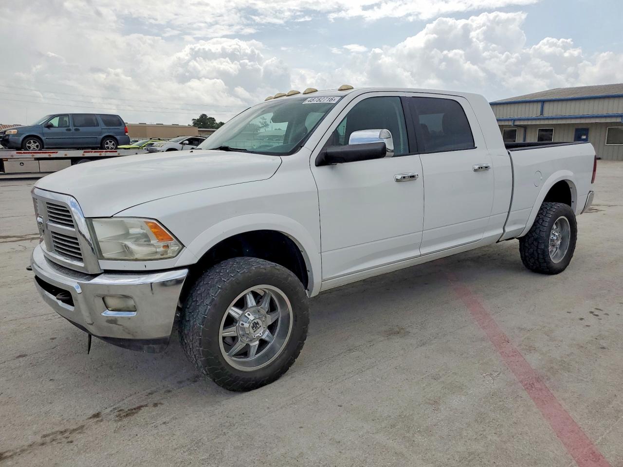 2012 Ram 3500 Laramie Limited, VIN 3C63D3NL2CG252524 — Minor dents and scratches