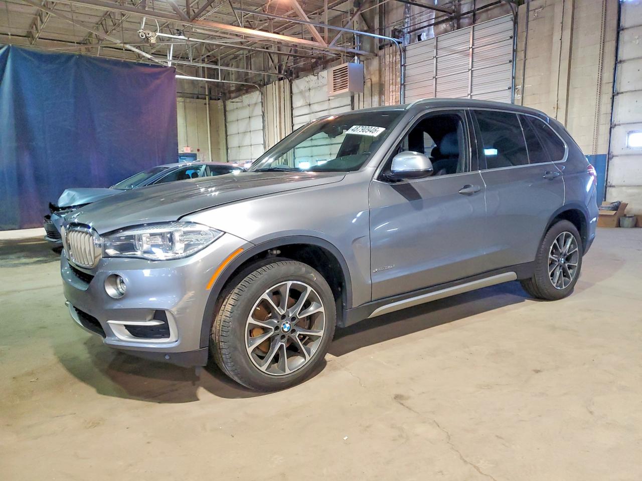 2018 BMW X5 xDrive35i, VIN 5UXKR0C5XJL074448 — Rear end