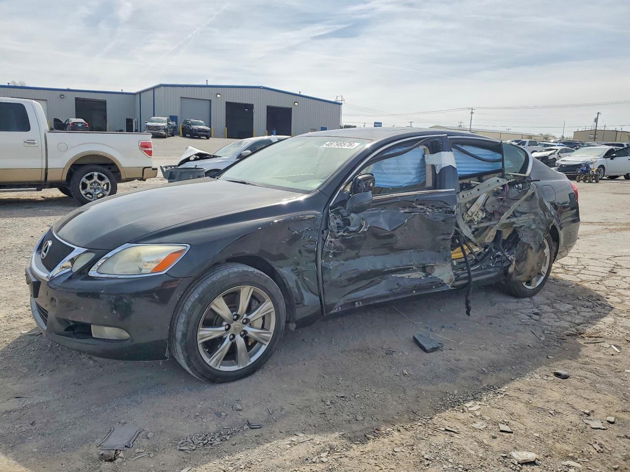 2011 Lexus GS 350, VIN JTHCE1KS7B0028771 — Бок