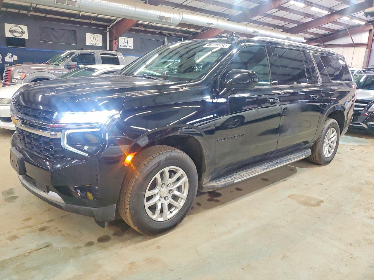 2021 Chevrolet Suburban LS, VIN 1GNSKBKDXMR492589 — Minor dents and scratches