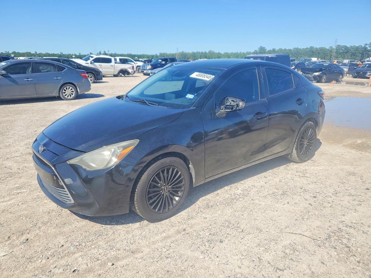 2016 Scion iA, VIN 3MYDLBZV4GY142193 — Бок