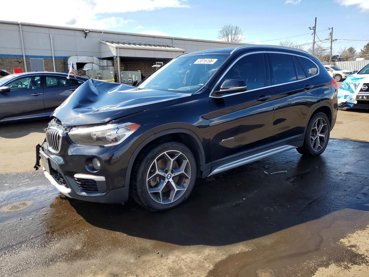 2018 BMW X1 xDrive28i, VIN WBXHT3C38J5L26315 — Front end