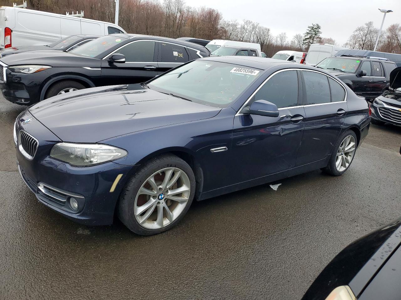 2014 BMW 5 Series 535i xDrive, VIN WBA5B3C59ED531042 — Side