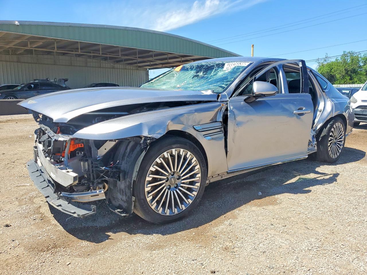 2023 Genesis G80, VIN KMTGE4S1XPU007359 — Side