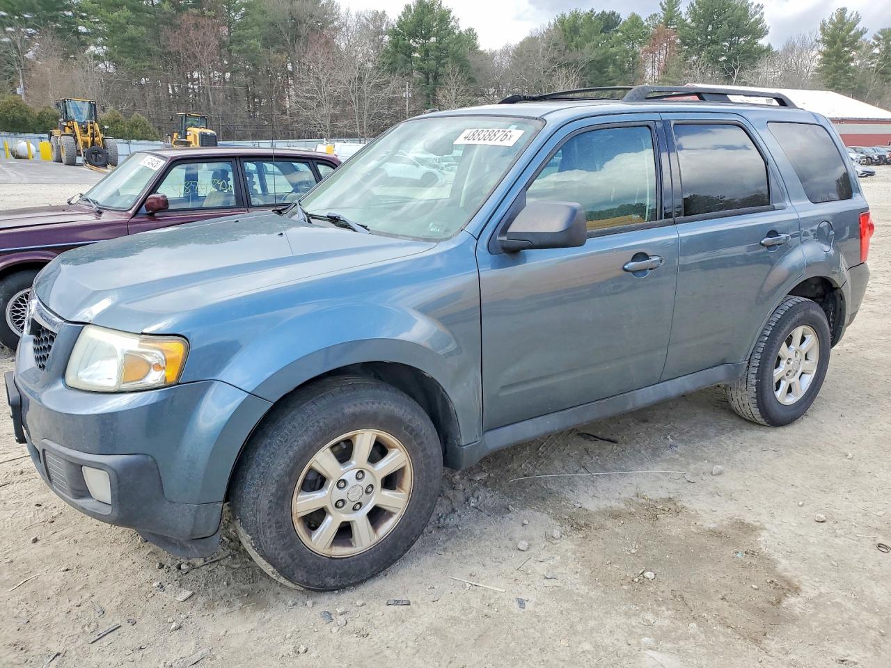 2011 Mazda Tribute Touring, VIN 4F2CY9C70BKM04801 — Мелкие вмятины и царапины