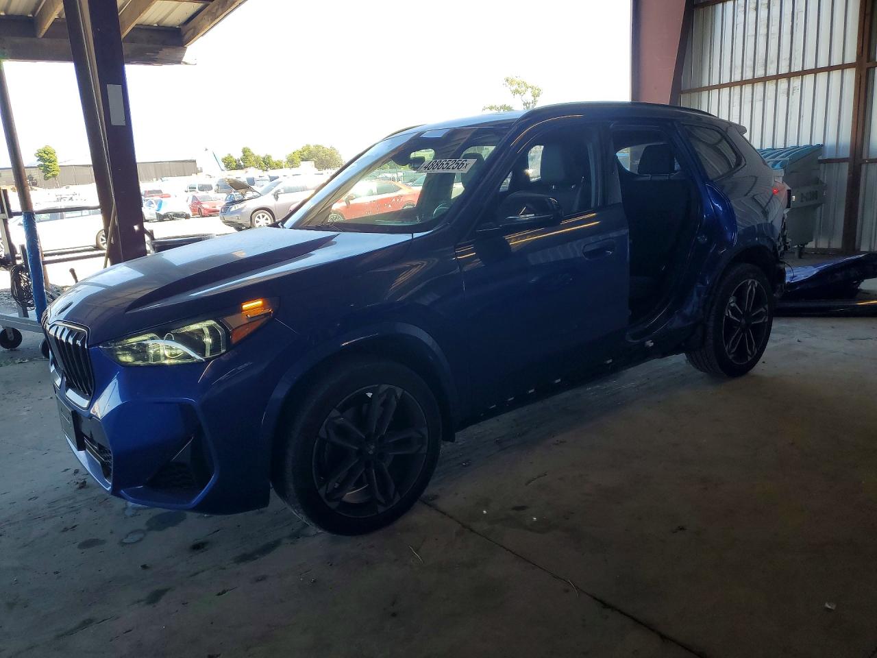 2023 BMW X1 xDrive28i, VIN WBX73EF0XP5Y06910 — Side