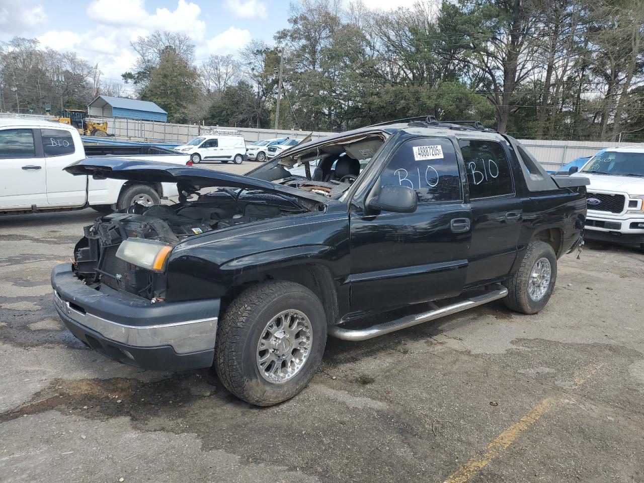 2004 Chevrolet Avalanche Z66, VIN 3GNEC12T14G204003 — Rollover