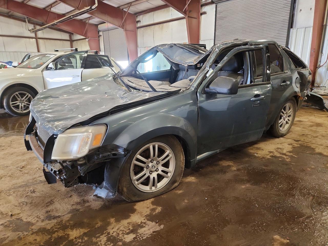 2010 Mercury Mariner Premier, VIN 4M2CN9HG2AKJ14893 — Rollover