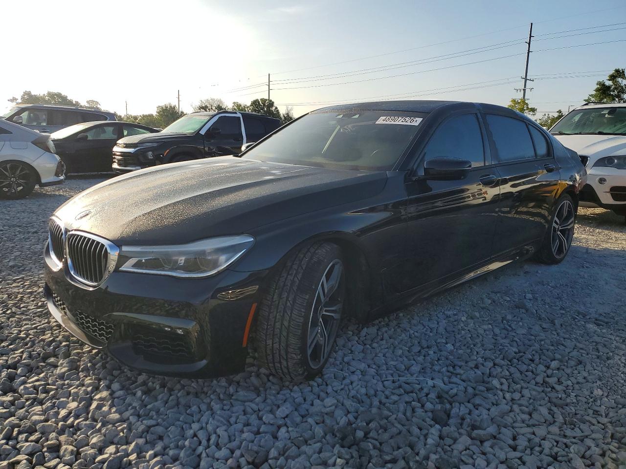2016 BMW 7 Series 750i, VIN WBA7F0C55GGM20713 — Rear end