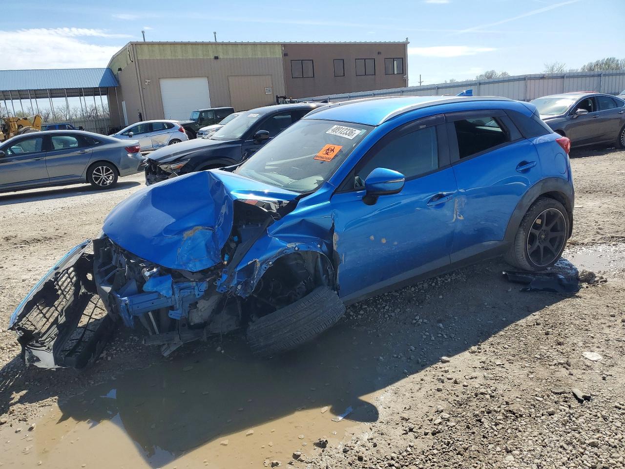 2016 Mazda CX-3 Touring, VIN JM1DKFC7XG0129252 — Front end