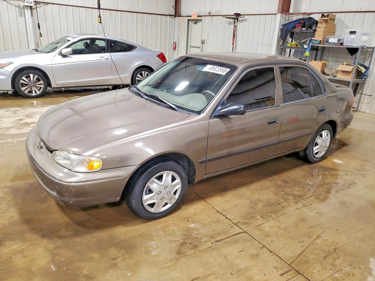 1999 Chevrolet Prizm, VIN 1Y1SK5280XZ449540 — Rear end