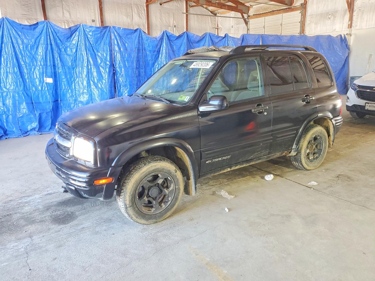 2004 Chevrolet Tracker ZR2, VIN 2CNBJ734246907337 — Side