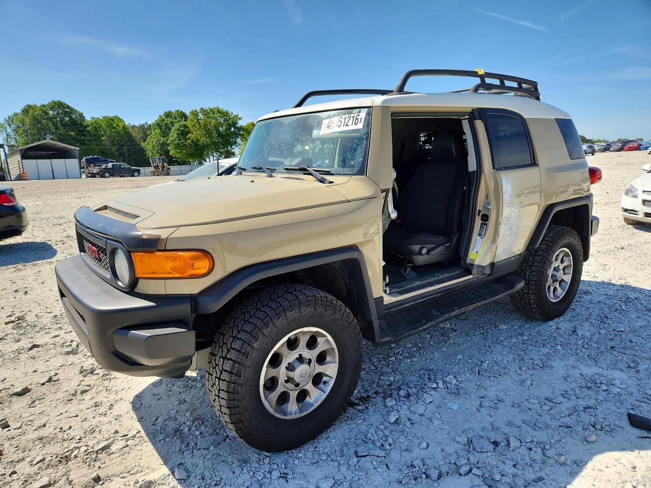 2013 Toyota FJ Cruiser, VIN JTEBU4BF7DK150280 — Side