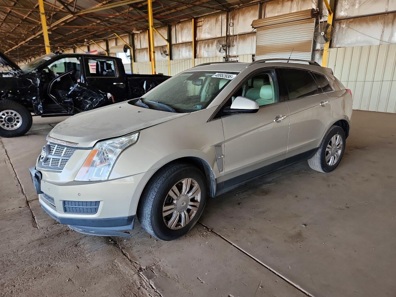 2011 Cadillac SRX Luxury Collection, VIN 3GYFNAEY2BS636084 — Normal wear