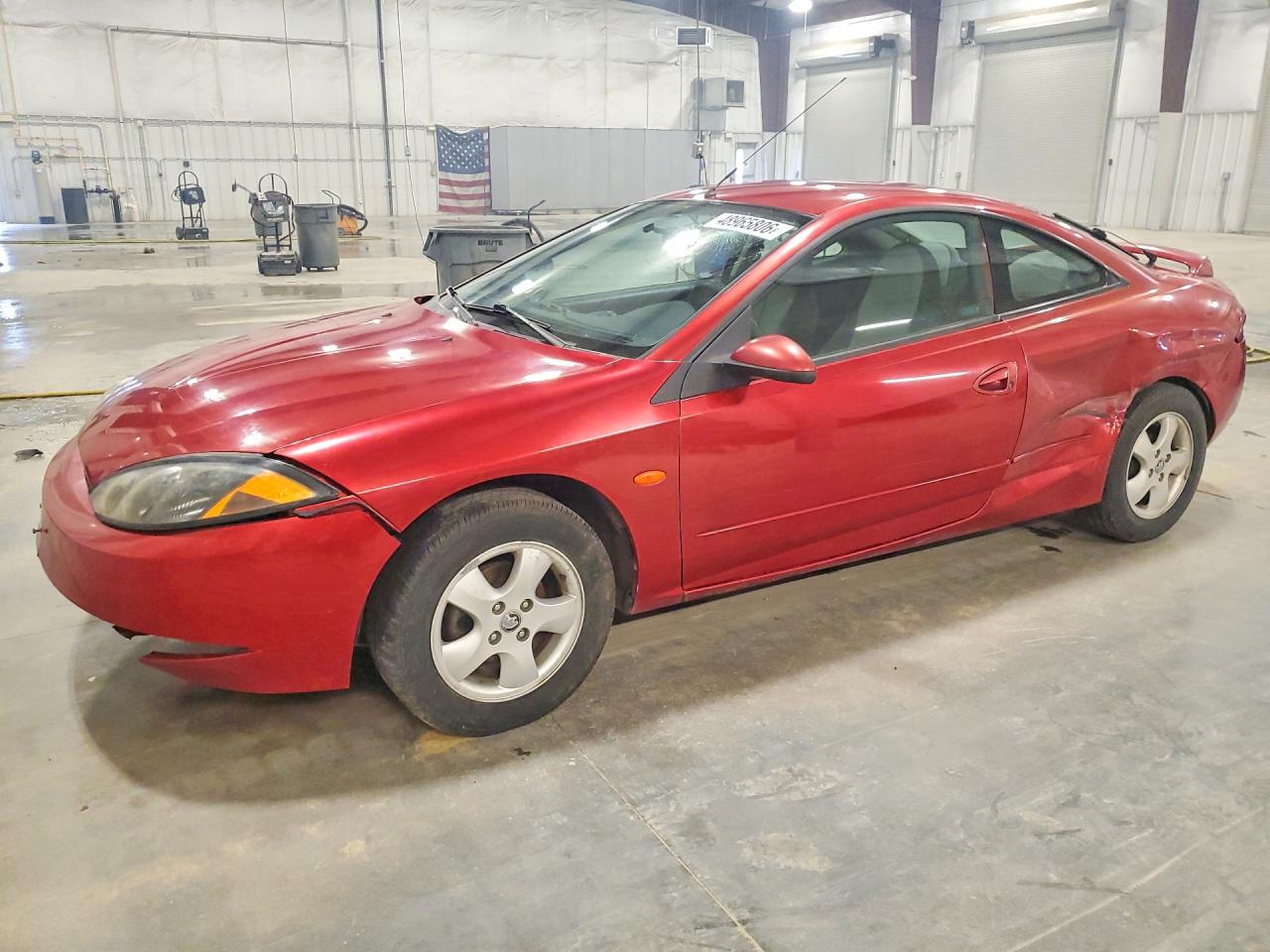 1999 Mercury Cougar, VIN 1ZWFT6031X5618495 — Бок
