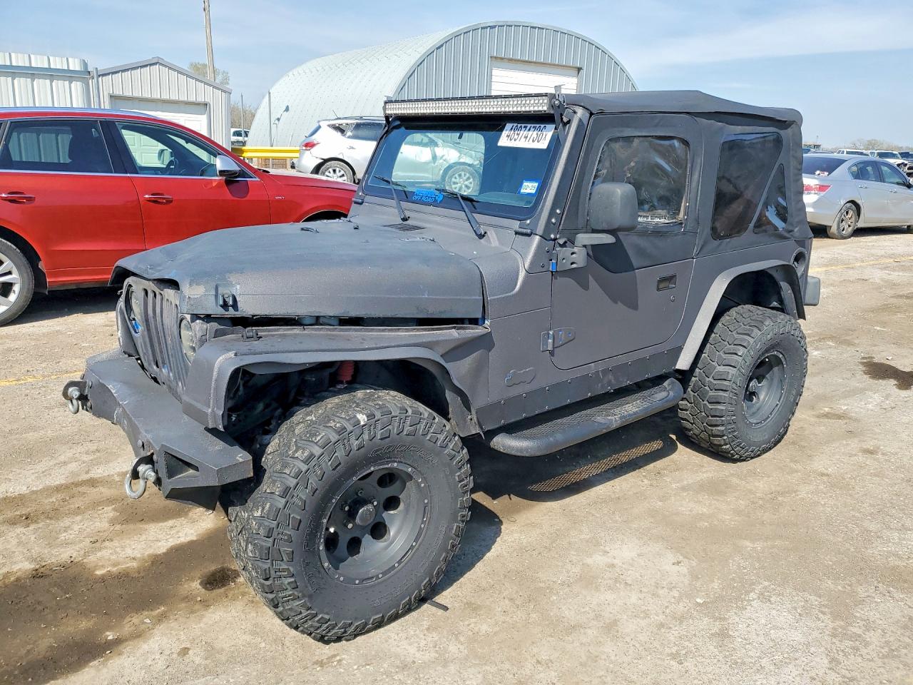 1999 Jeep Wrangler SE, VIN 1J4FY29P6XP476621 — Front end