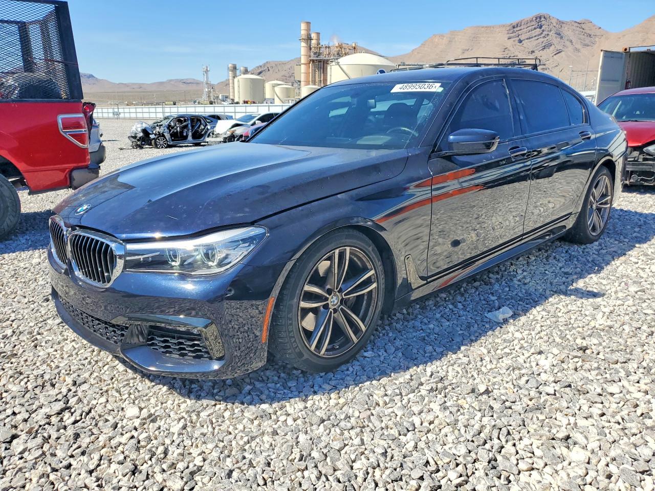 2016 BMW 7 Series 740i, VIN WBA7E2C53GG547894 — Rear end