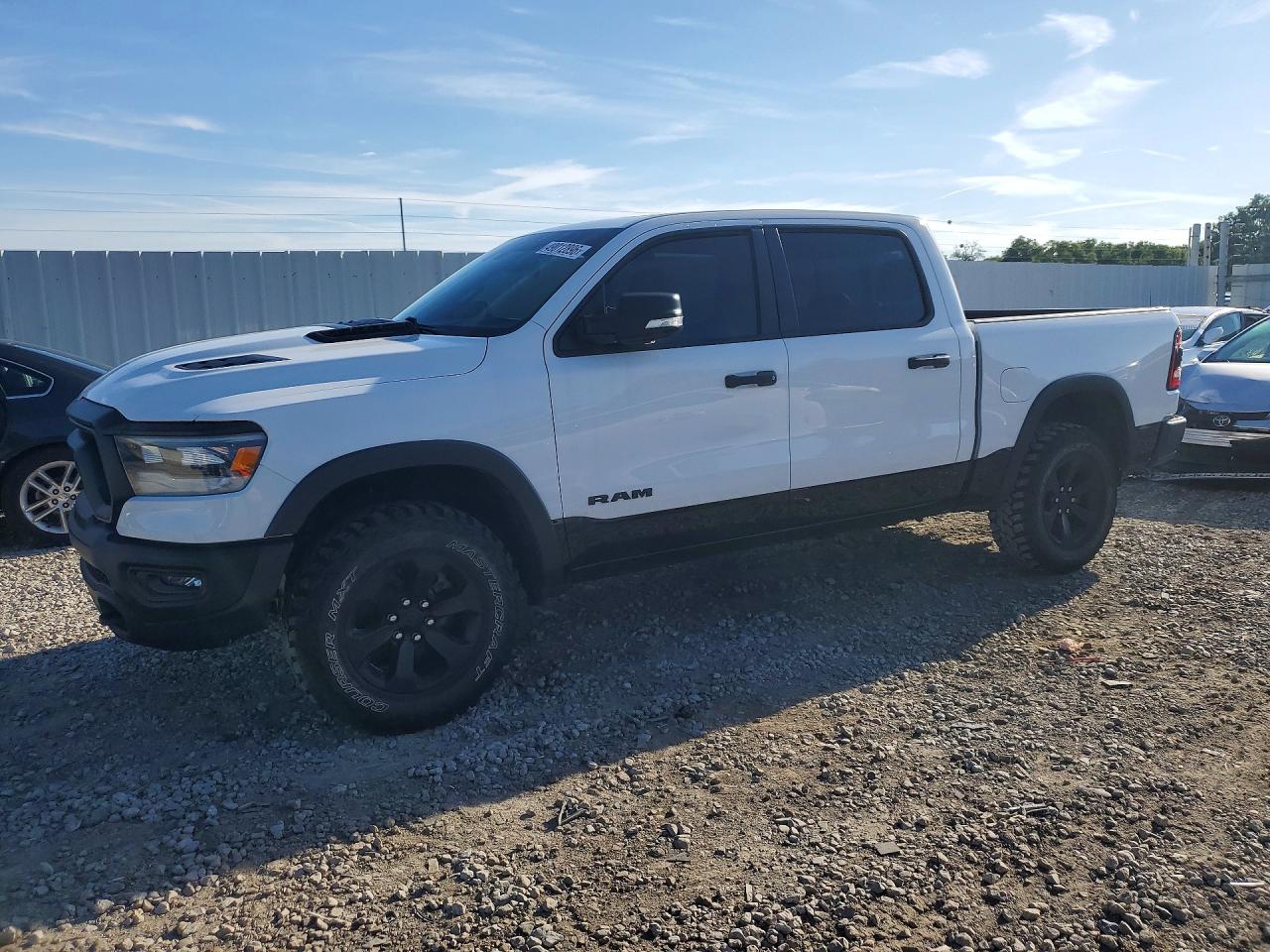 2021 Ram 1500 Rebel, VIN 1C6SRFLTXMN619695 — Minor dents and scratches