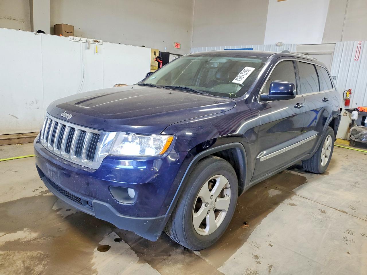 2013 Jeep Grand Cherokee Laredo, VIN 1C4RJFAG0DC560737 — Rear end