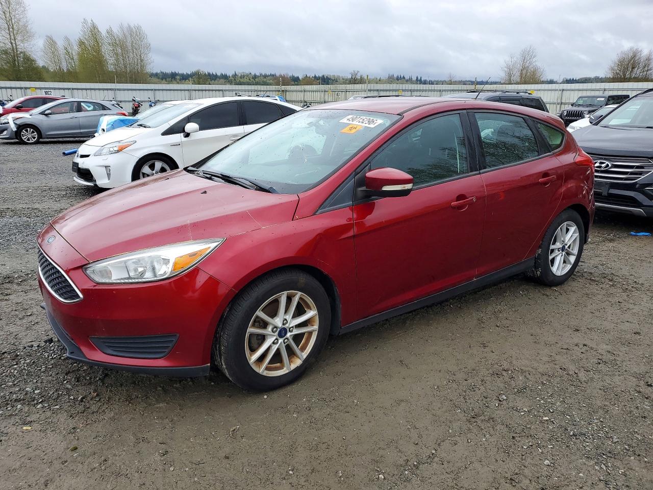 2015 Ford Focus SE, VIN 1FADP3K26FL306842 — Minor dents and scratches