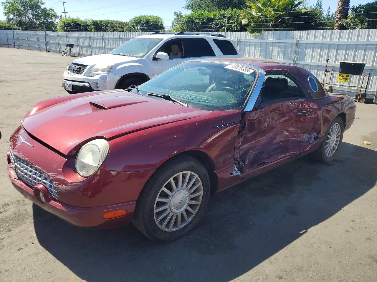 2004 Ford Thunderbird Deluxe, VIN 1FAHP60A34Y106580 — Бок