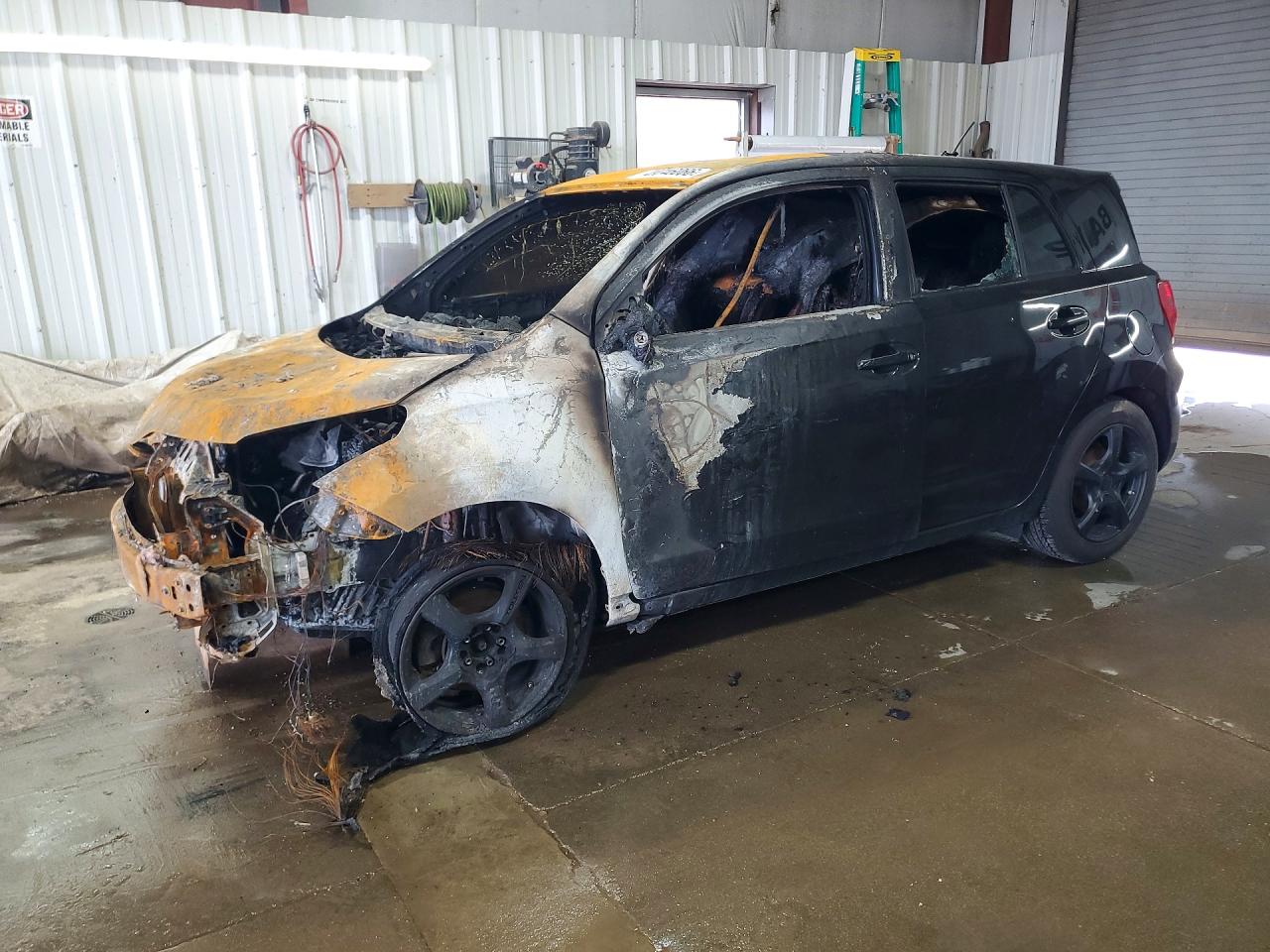 2011 Scion xD, VIN JTKKU4B42B1011575 — Engine fire