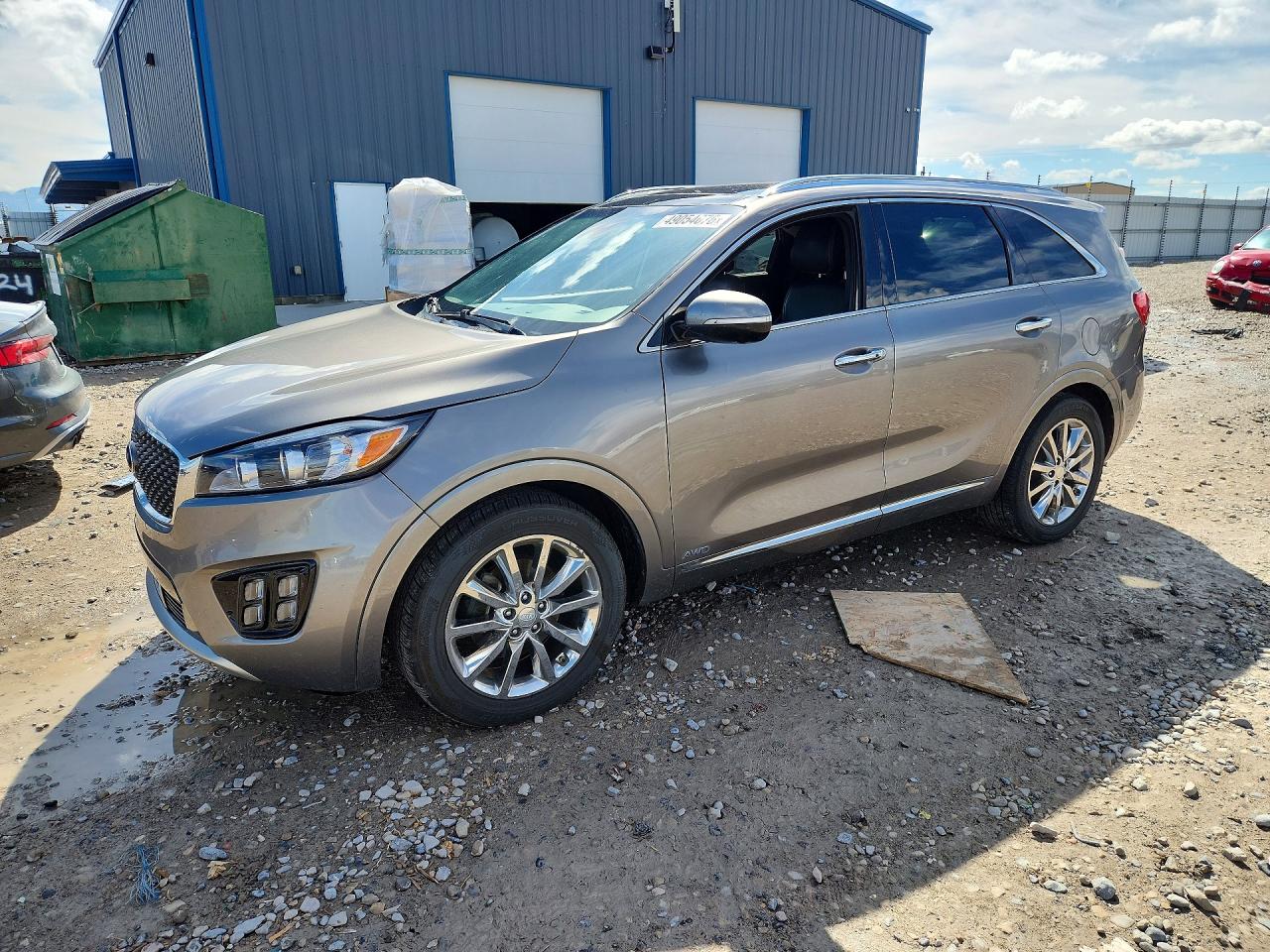 2016 Kia Sorento SX, VIN 5XYPKDA58GG001279 — Side
