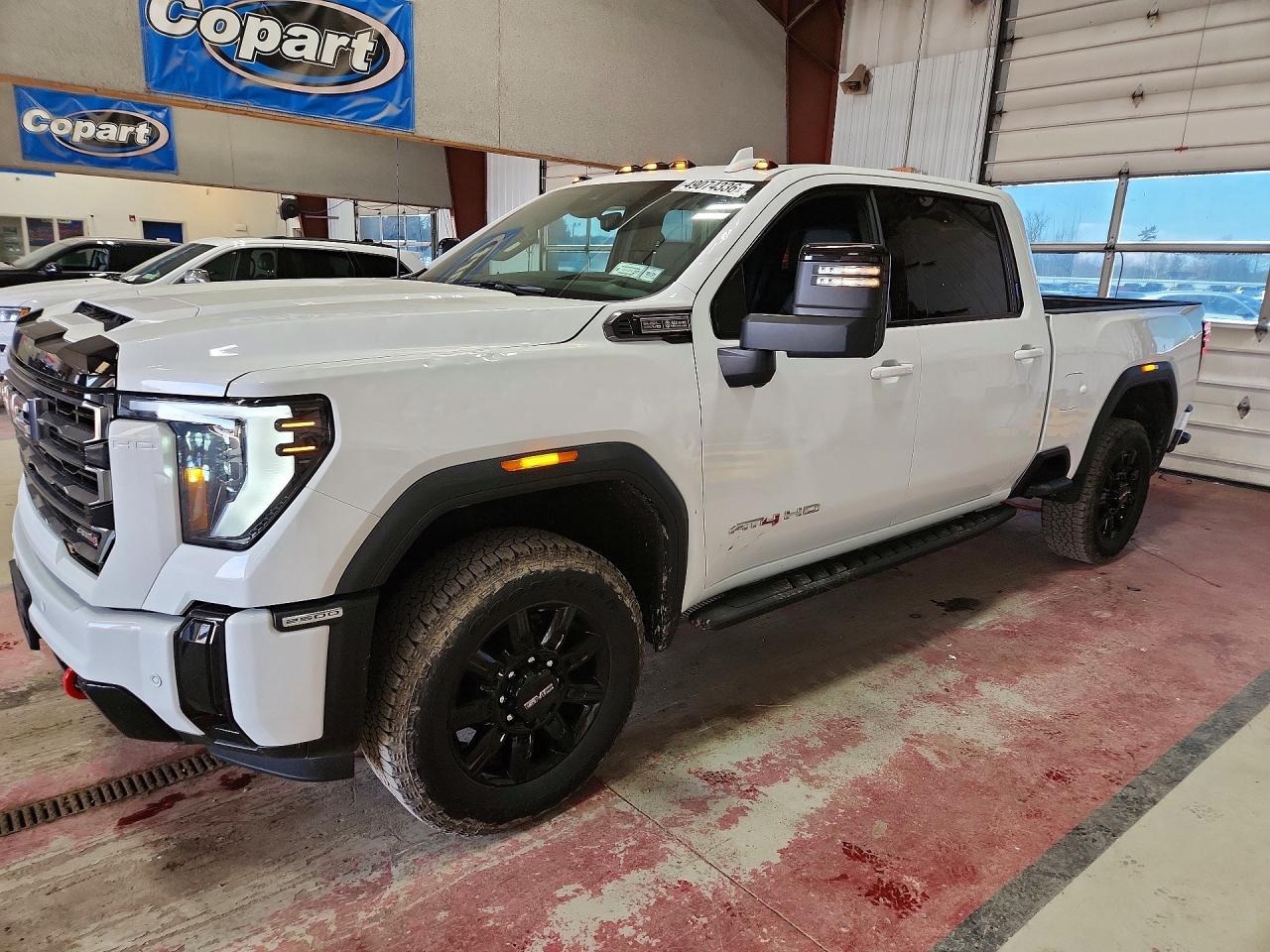 2025 GMC Sierra 2500HD AT4, VIN 1GT4UPE71SF349639 — Hail