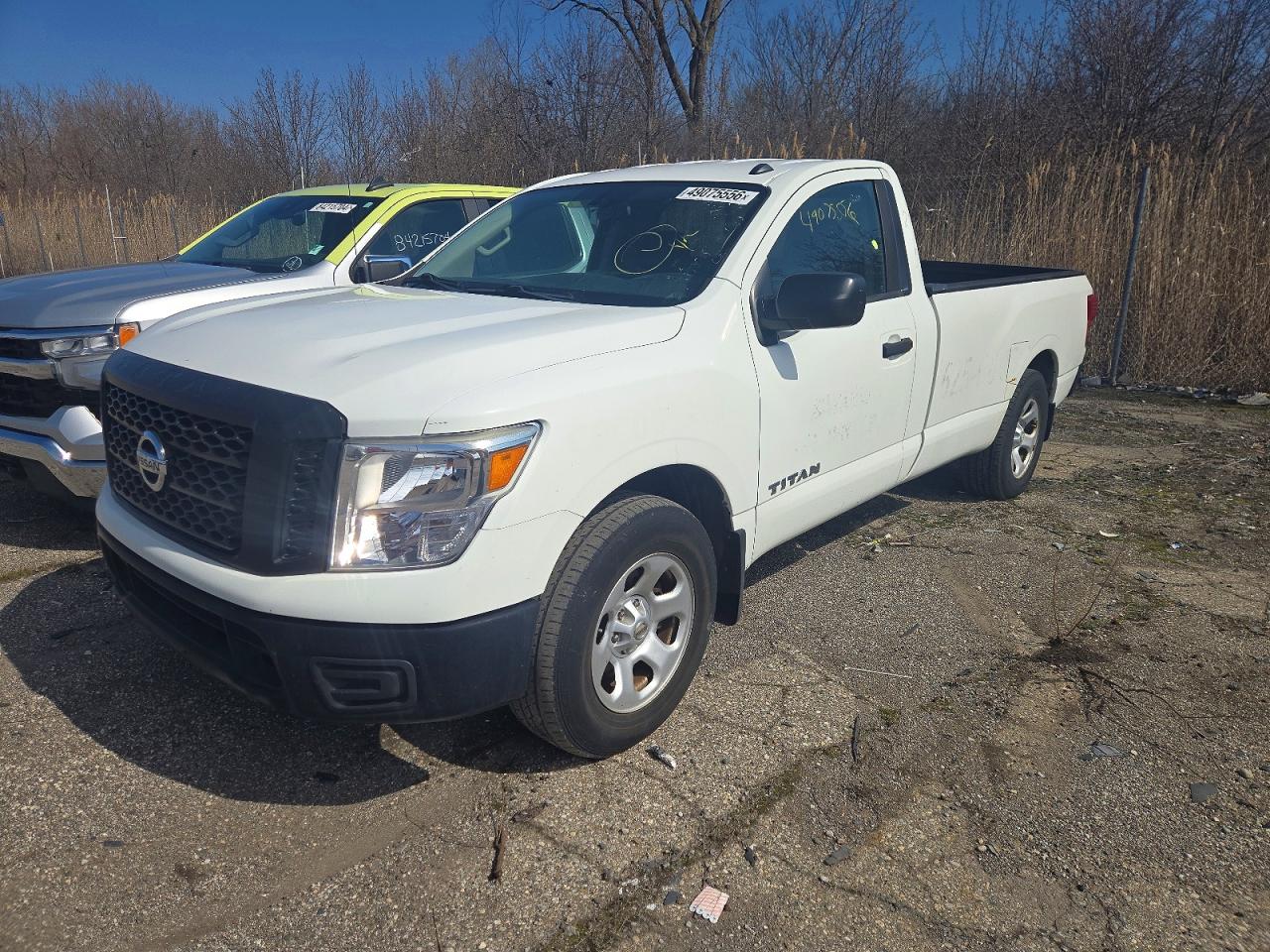 2019 Nissan Titan S, VIN 1N6AA1R70KN521908 — Side