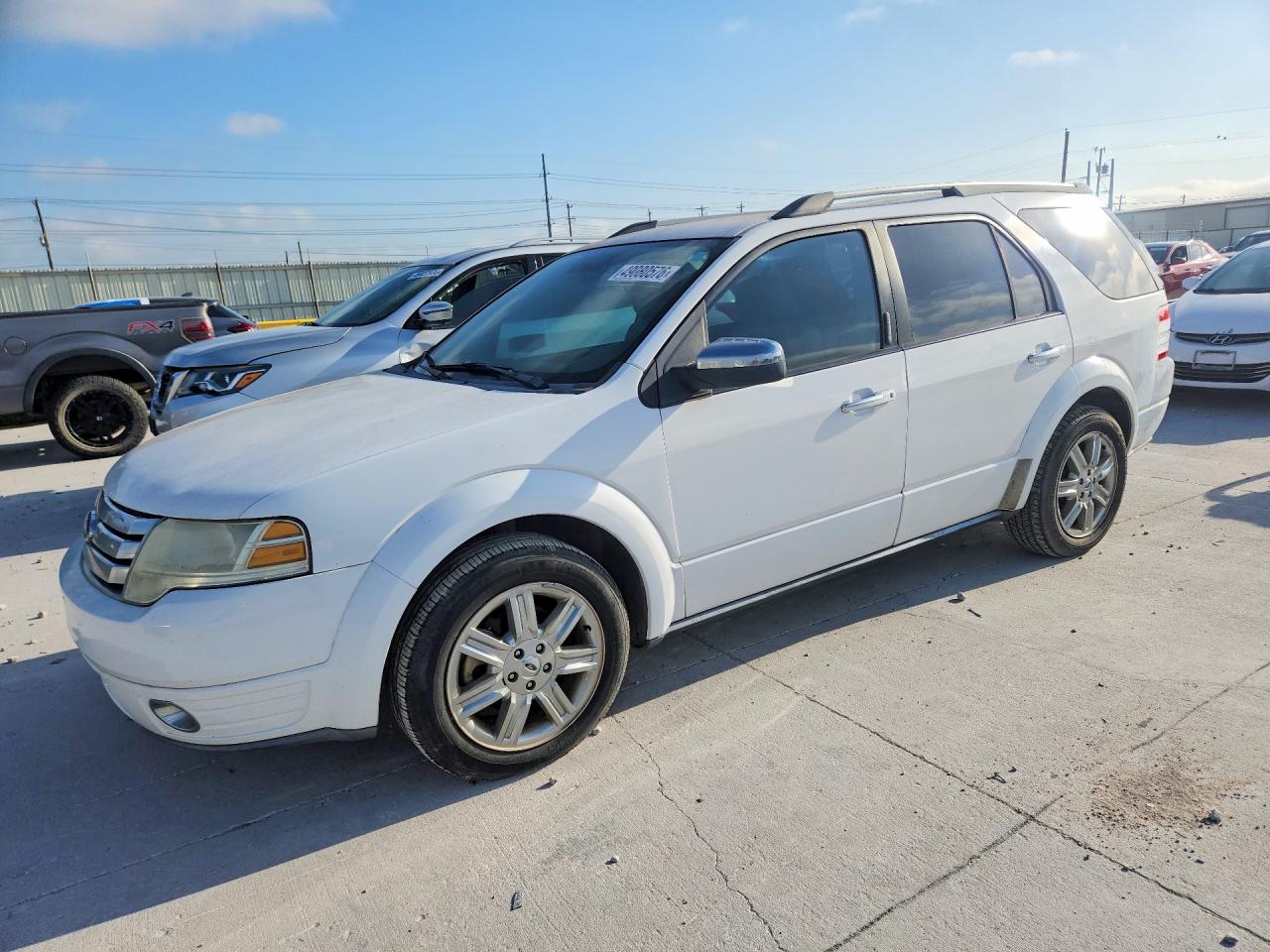 2008 Ford Taurus X Limited, VIN 1FMDK03W68GA10400 — Minor dents and scratches