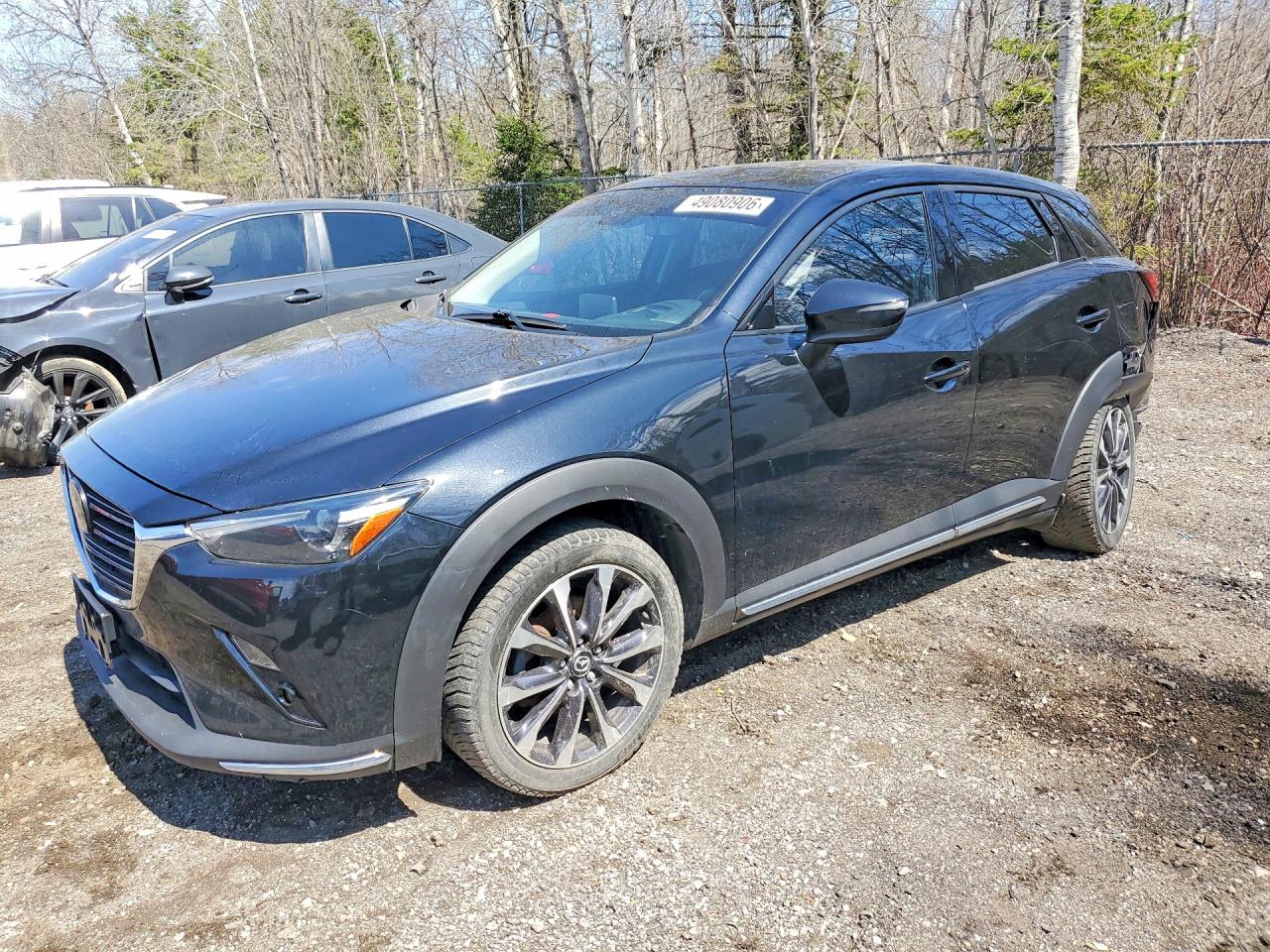 2021 Mazda CX-3 GT, VIN JM1DKFD77M1510139 — Rear end